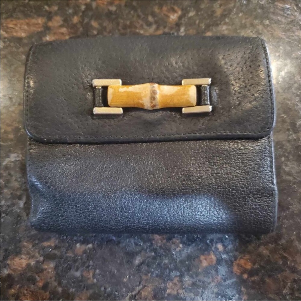 Gucci Black Leather Wallet with Gold Accents